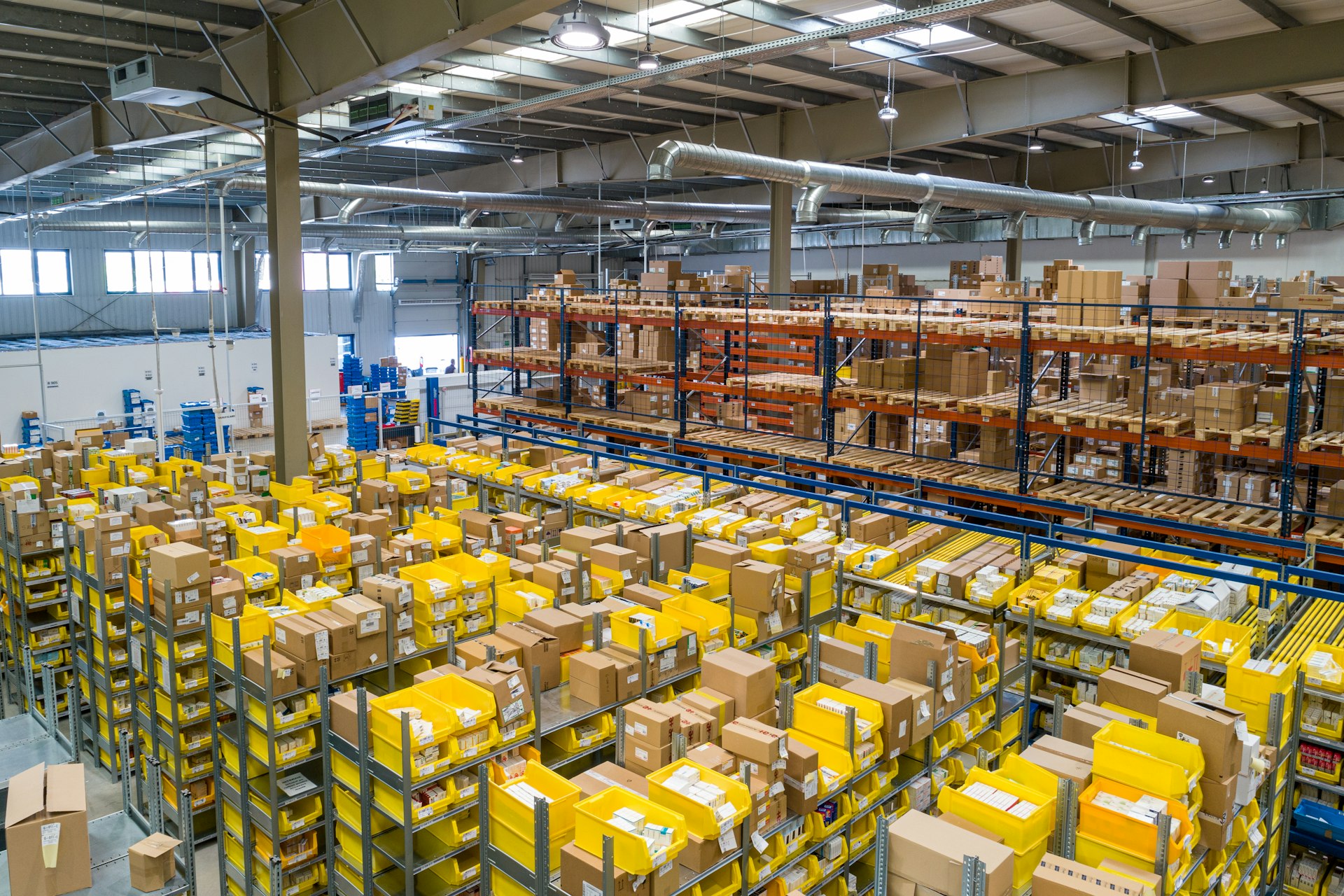 Courier warehouse team preparing parcels for dispatch